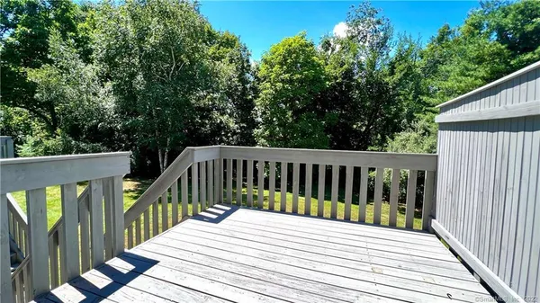 a view of a wooden roof deck