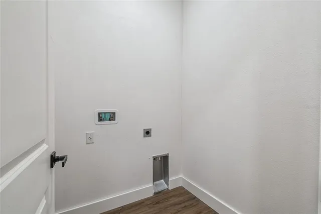 a view of a small space with wooden floor