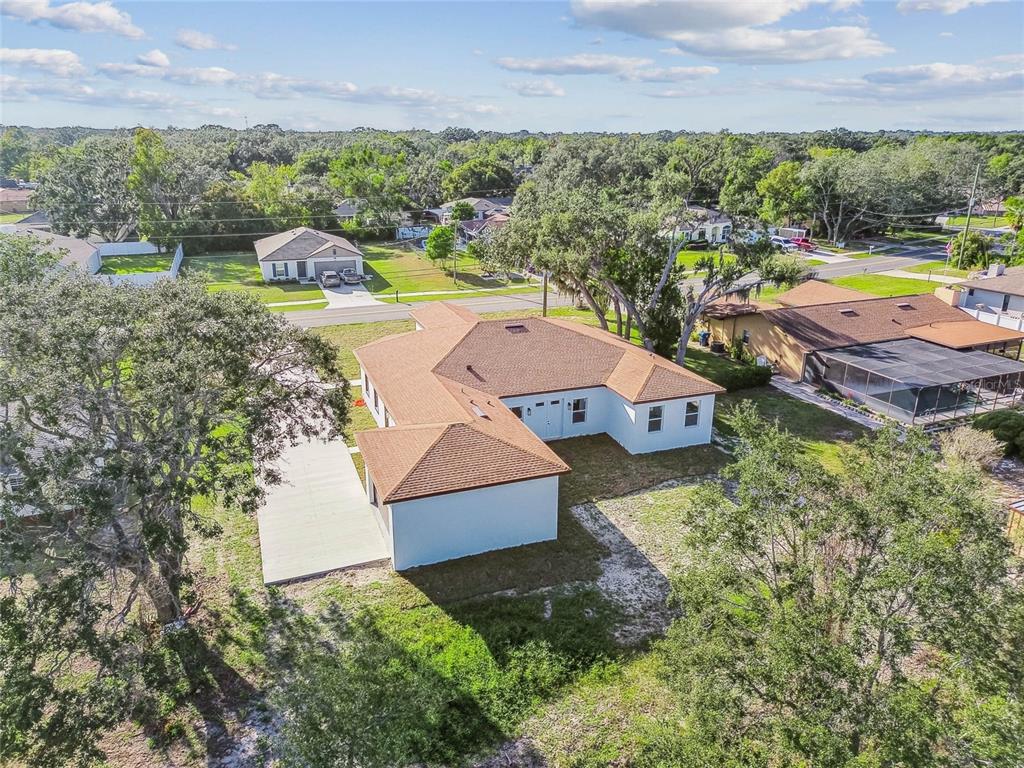 310 Waterfall Drive Spring Hill, FL 34608 - Photo 38 of 40 an aerial view of residential house with outdoor space and swimming pool
