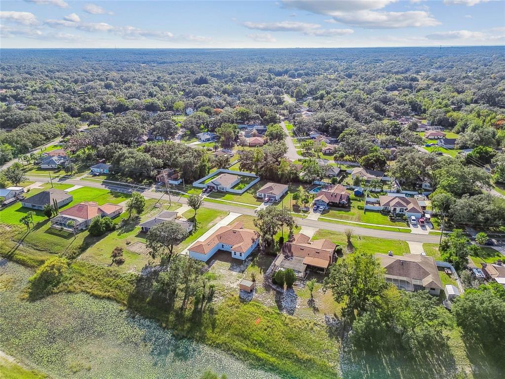 310 Waterfall Drive Spring Hill, FL 34608 - Photo 39 of 40 an aerial view of residential houses with outdoor space