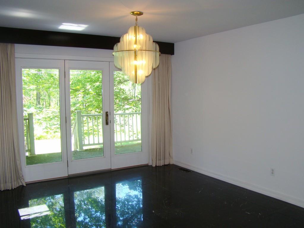186 Cedarwood Road Auburn, ME 04210 - Photo 11 of 35 Formal dining room showing patio...