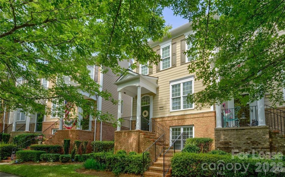 1104 Drayton Court Fort Mill, SC 29708 - Photo 3 of 20 front view of a house with a garden