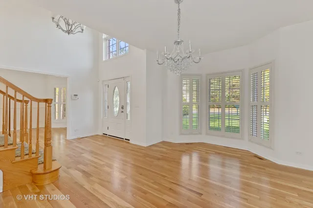 a view of an empty room with glass door