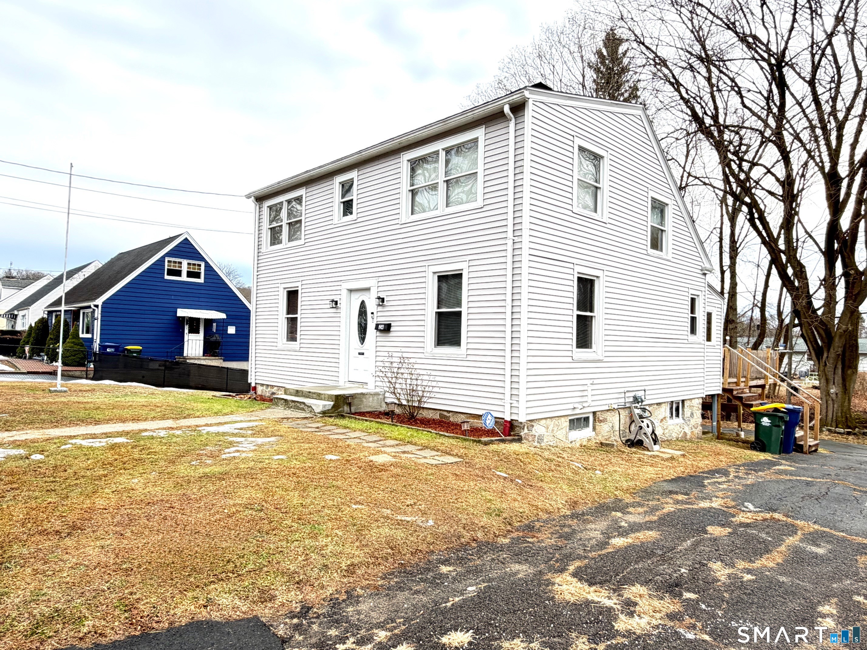 24 Byron Avenue Ansonia, CT 06401 - Photo 2 of 21 a view of a house with snow on the road