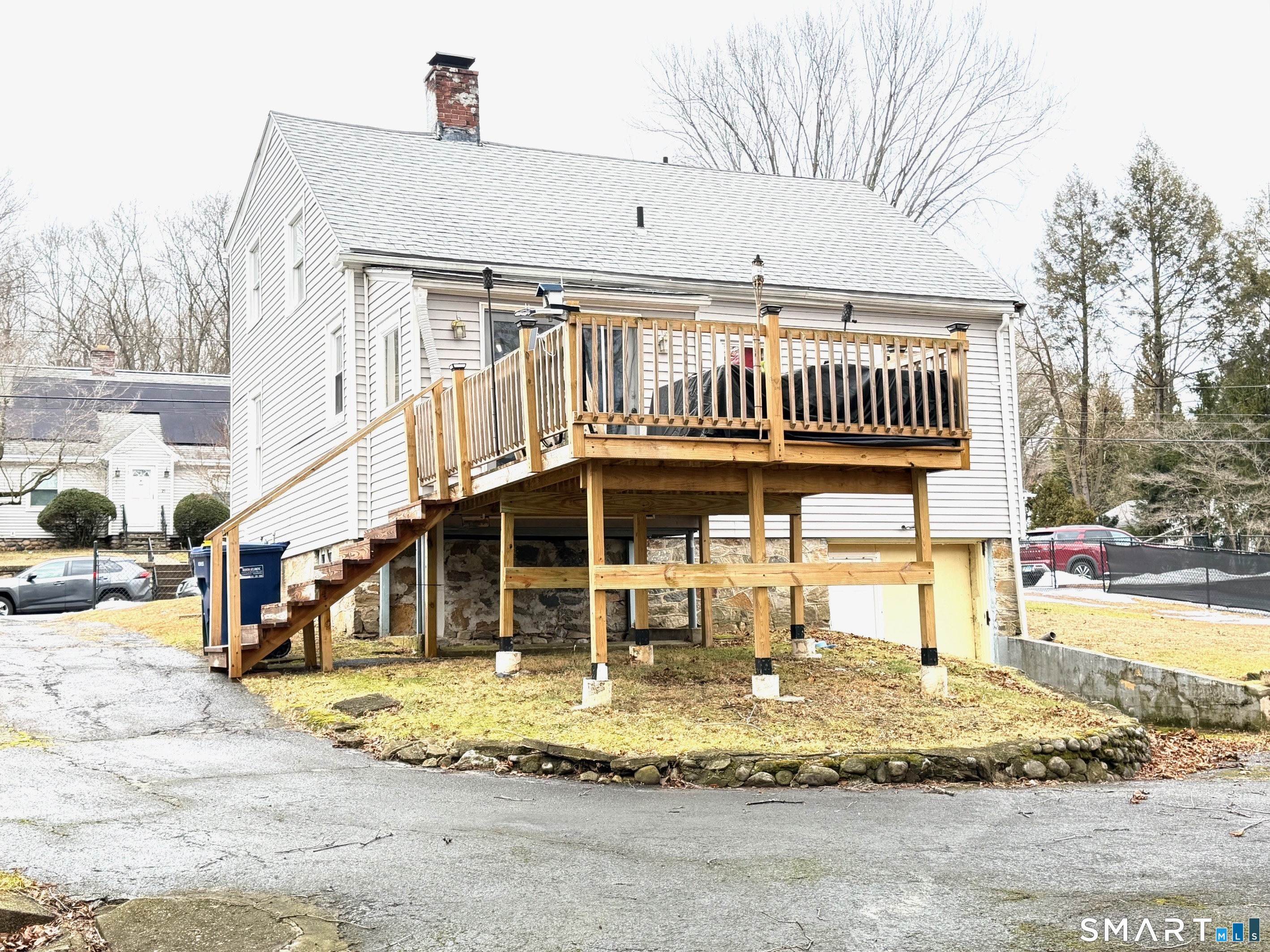 24 Byron Avenue Ansonia, CT 06401 - Photo 3 of 21 a view of a house with a wooden deck
