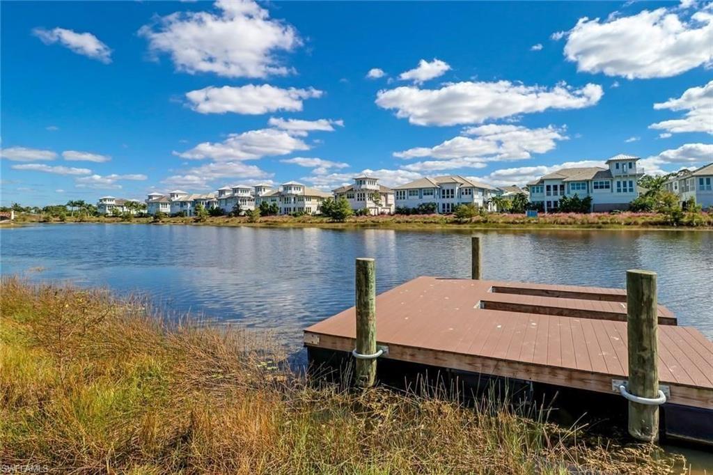 6299 Arriba Avenue Naples, FL 34113 - Photo 26 of 26 Dock featuring a residential view and a water view