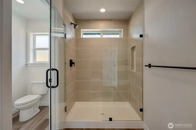 a bathroom with a bath tub and a shower