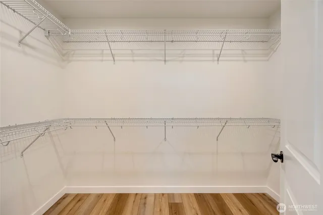 a view of a room with racks on the wall