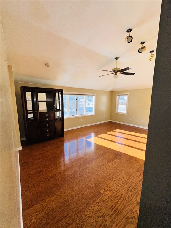 82 East High Street, Unit 1 Avon, MA 02322 - Photo 17 of 21 a view of an empty room with a window