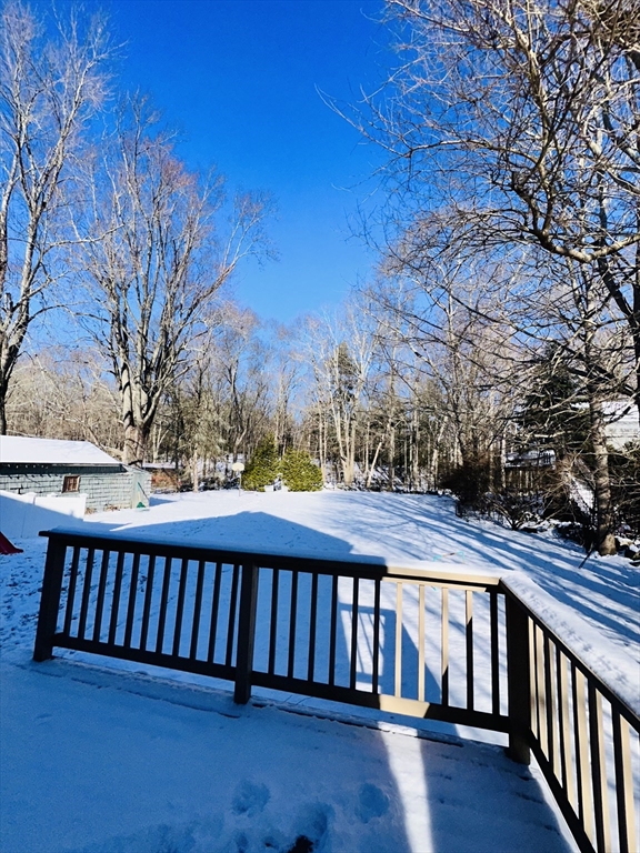 82 East High Street, Unit 1 Avon, MA 02322 - Photo 20 of 21 a view of wooden deck