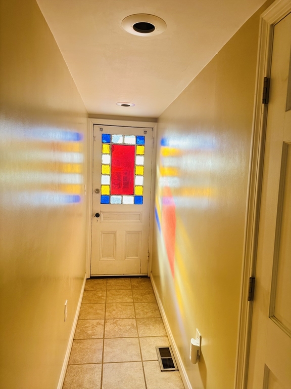 82 East High Street, Unit 1 Avon, MA 02322 - Photo 2 of 21 a bathroom with a mirror
