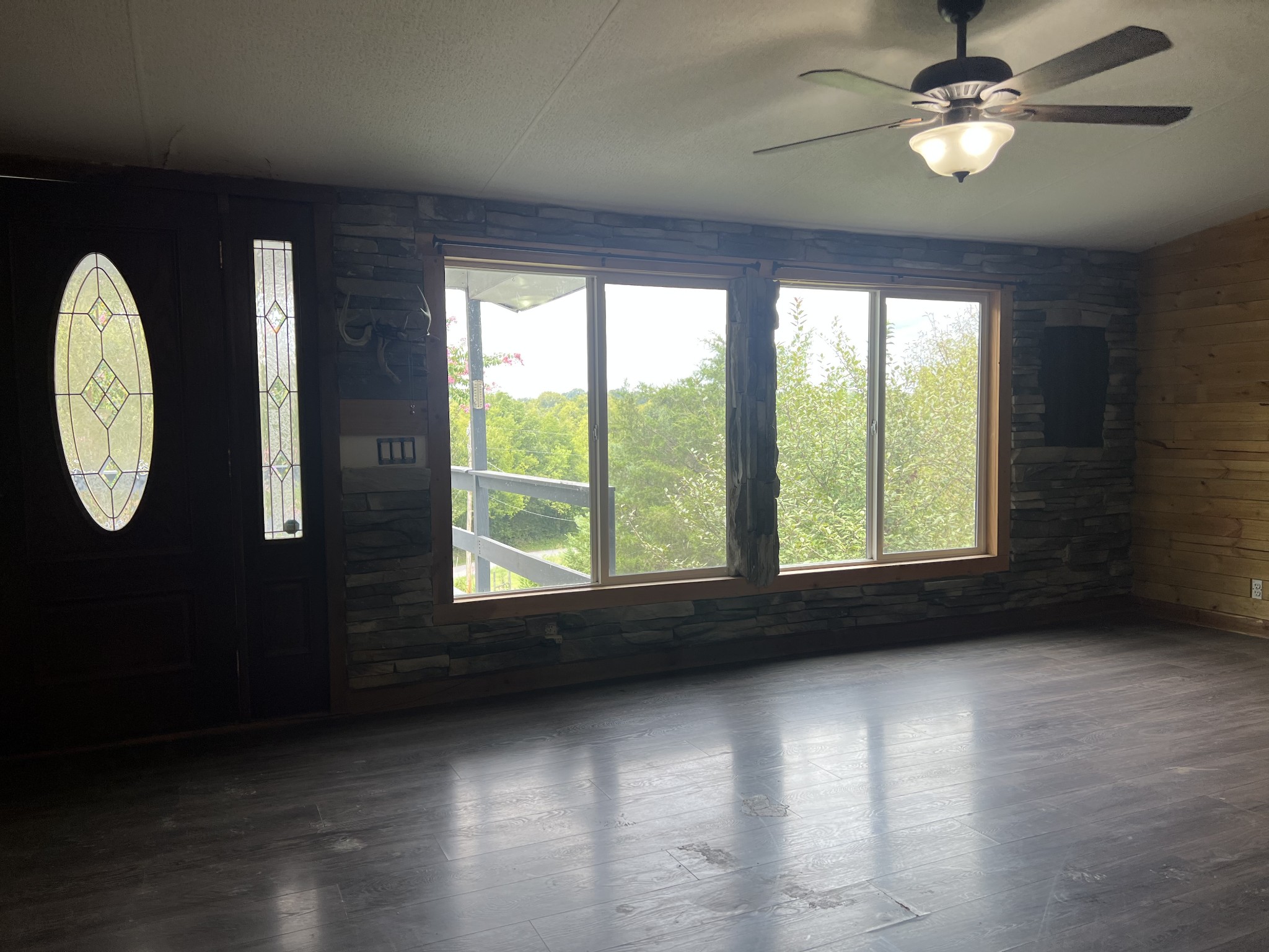 2999 Demastus Road Culleoka, TN 38451 - Photo 16 of 59 a view of a livingroom with furniture wooden floor and a window