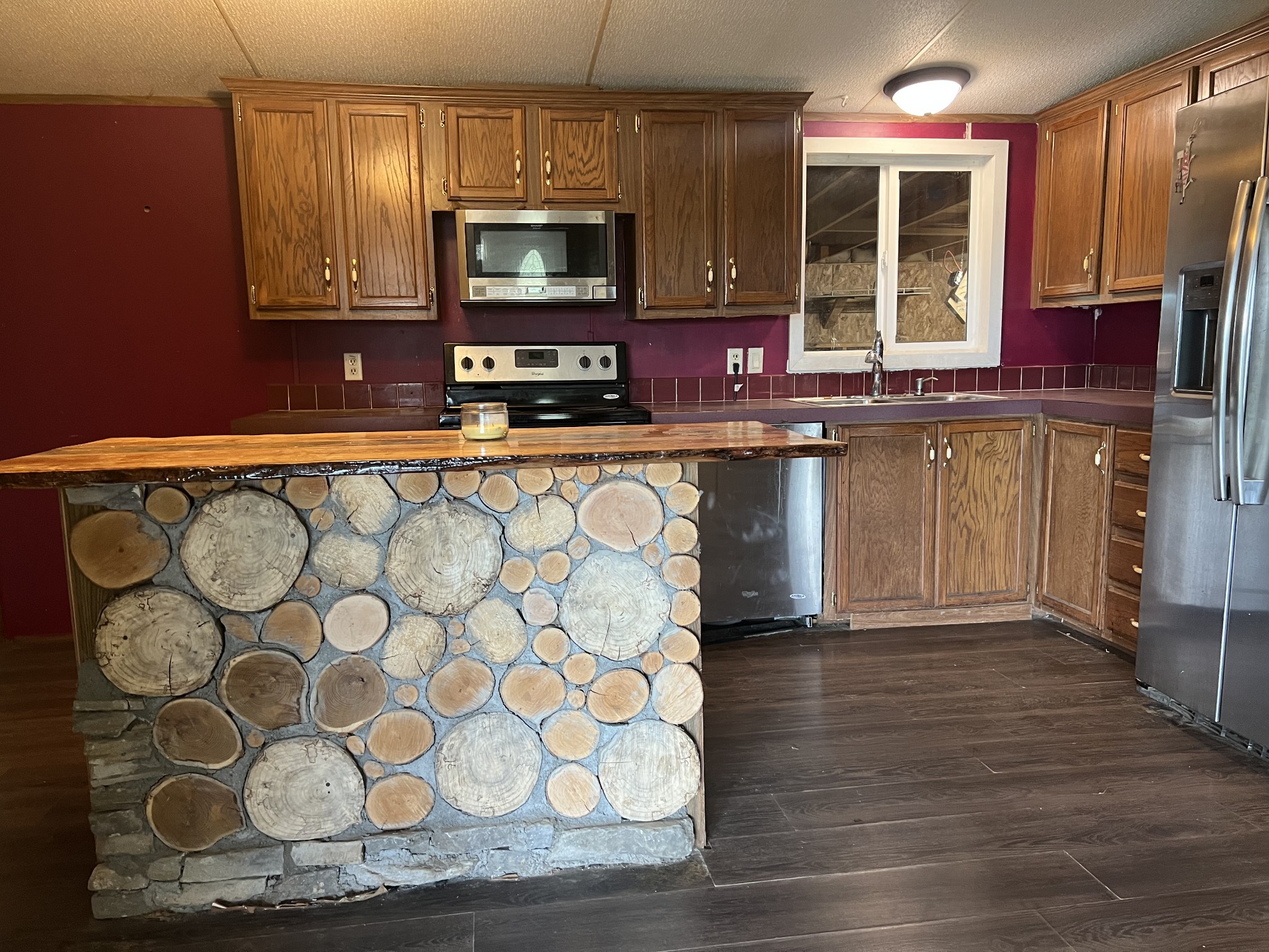 2999 Demastus Road Culleoka, TN 38451 - Photo 19 of 59 a kitchen with stainless steel appliances granite countertop a refrigerator and a stove top oven