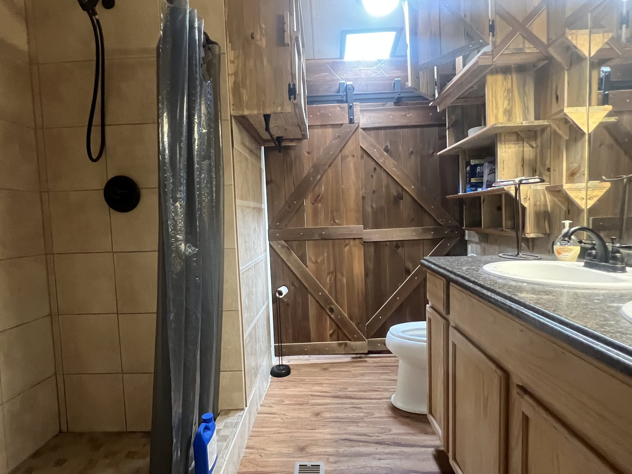 2999 Demastus Road Culleoka, TN 38451 - Photo 22 of 59 a bathroom with a sink and a mirror