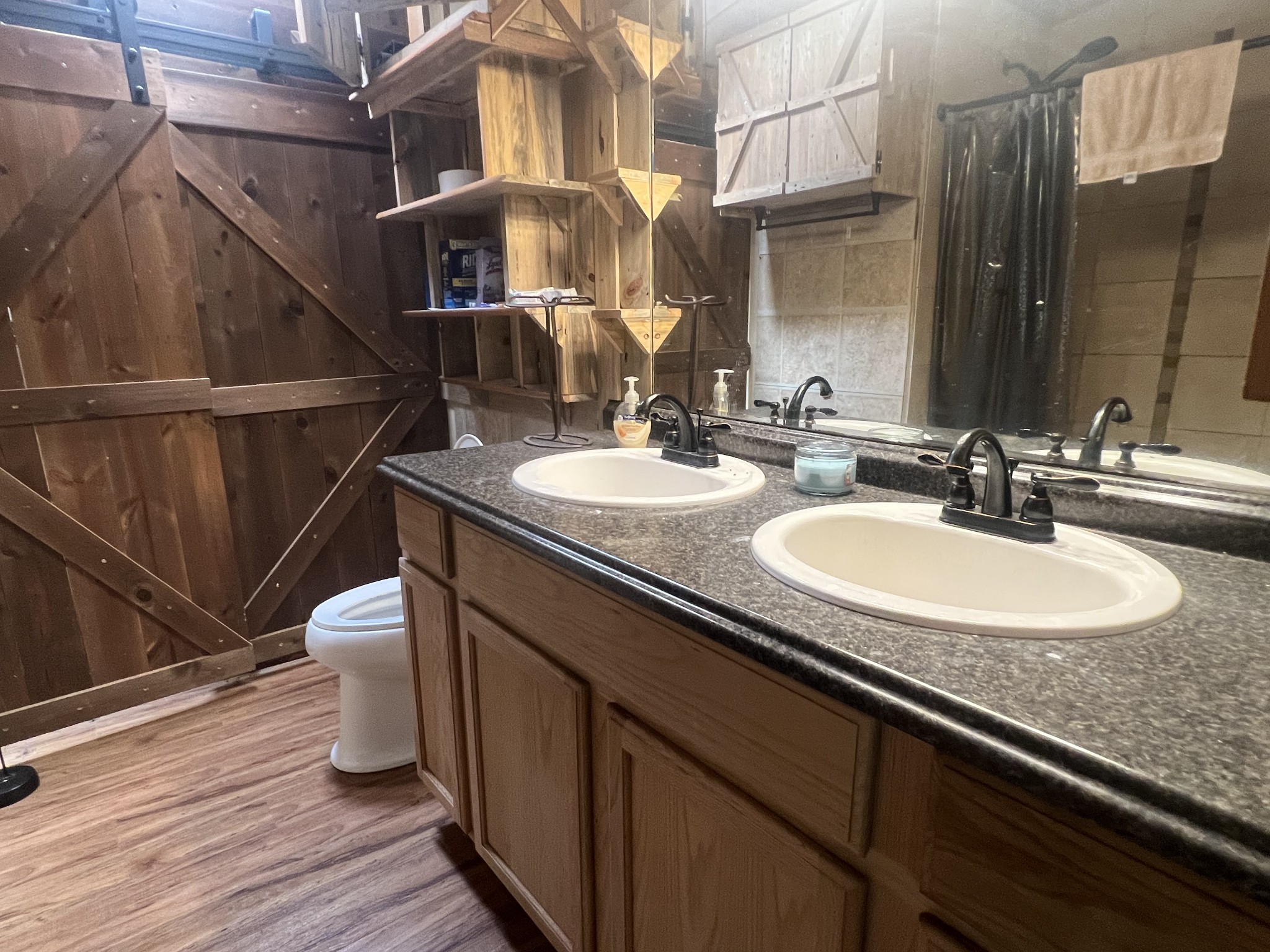 2999 Demastus Road Culleoka, TN 38451 - Photo 24 of 59 a bathroom with a sink and a mirror