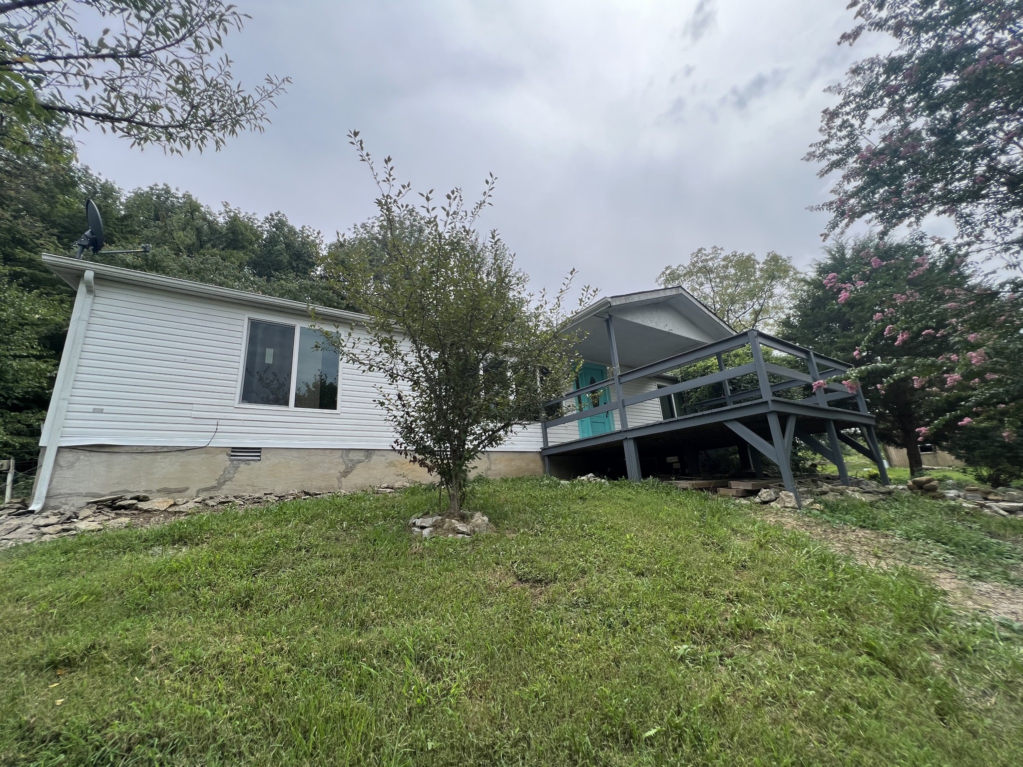 2999 Demastus Road Culleoka, TN 38451 - Photo 3 of 59 a backyard of a house with table and chairs