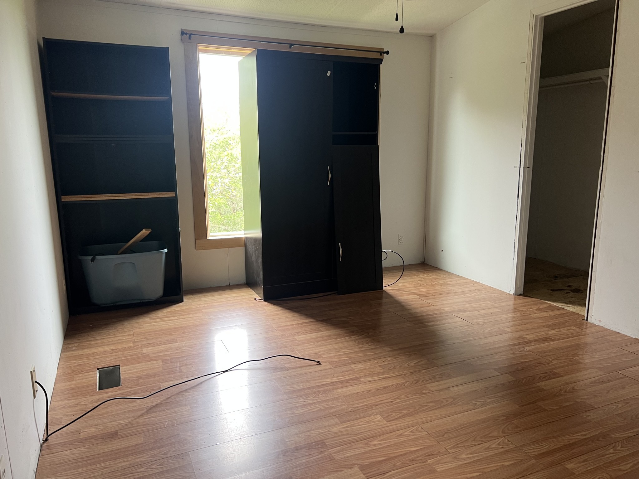 2999 Demastus Road Culleoka, TN 38451 - Photo 33 of 59 a view of an empty room with wooden floor and a window