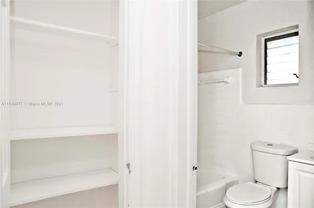 a view of a room with natural light