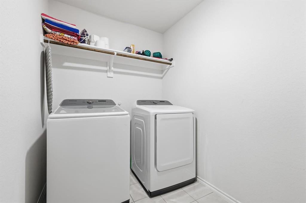 2416 Wildhaven Road Crandall, TX 75114 - Photo 16 of 35 a utility room with dryer and washer
