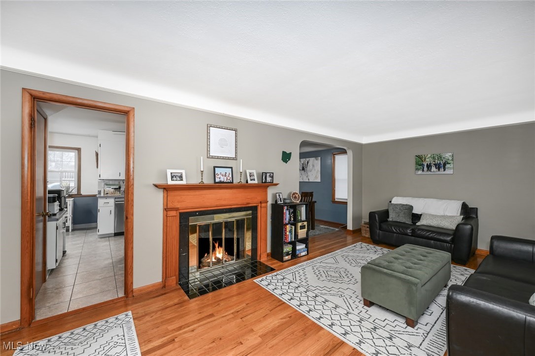 4940 Westbourne Road Cleveland, OH 44124 - Photo 5 of 26 Tiled living room featuring a tile fireplace