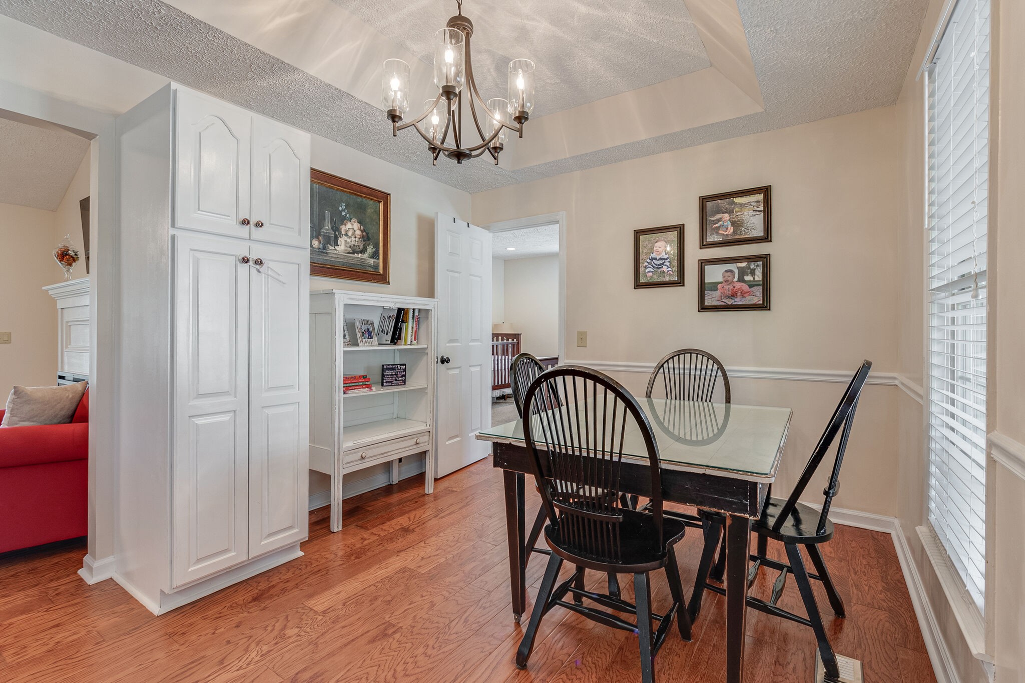 1686 Mann Road Lebanon, TN 37087 - Photo 14 of 31 a view of a dining room with furniture wooden floor and a chandelier