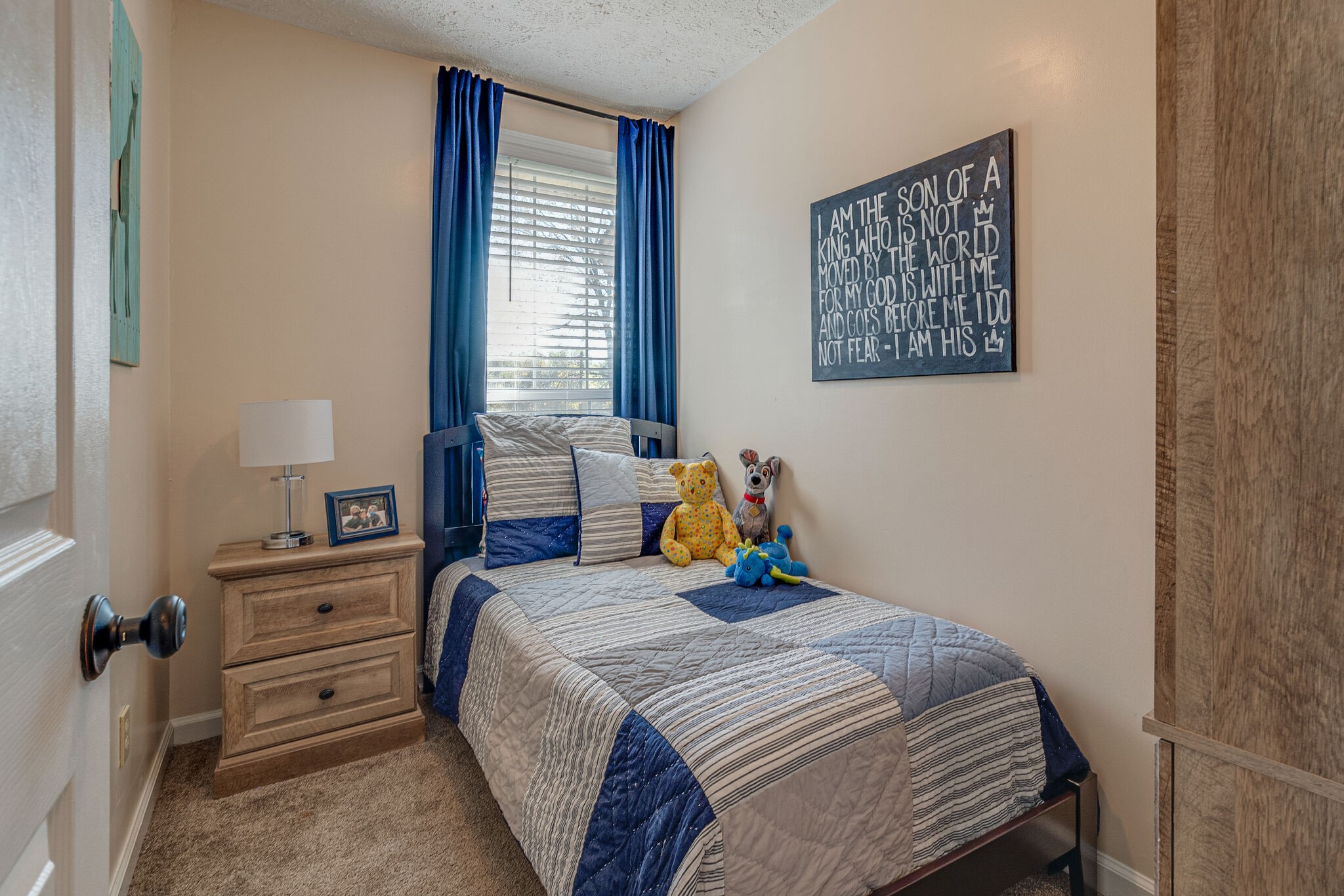 1686 Mann Road Lebanon, TN 37087 - Photo 22 of 31 a bedroom with a bed a window and painting on the wall