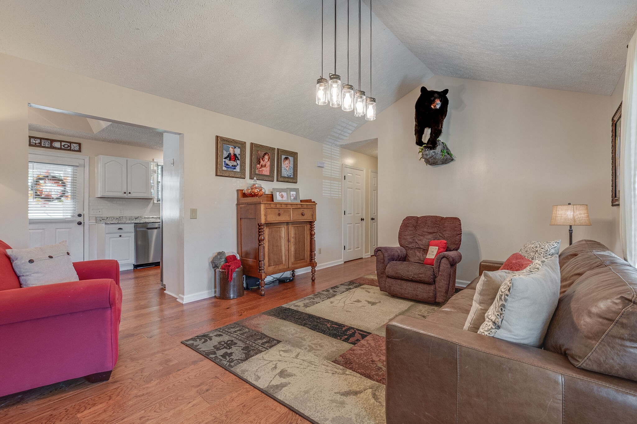 1686 Mann Road Lebanon, TN 37087 - Photo 6 of 31 a living room with furniture and a chandelier