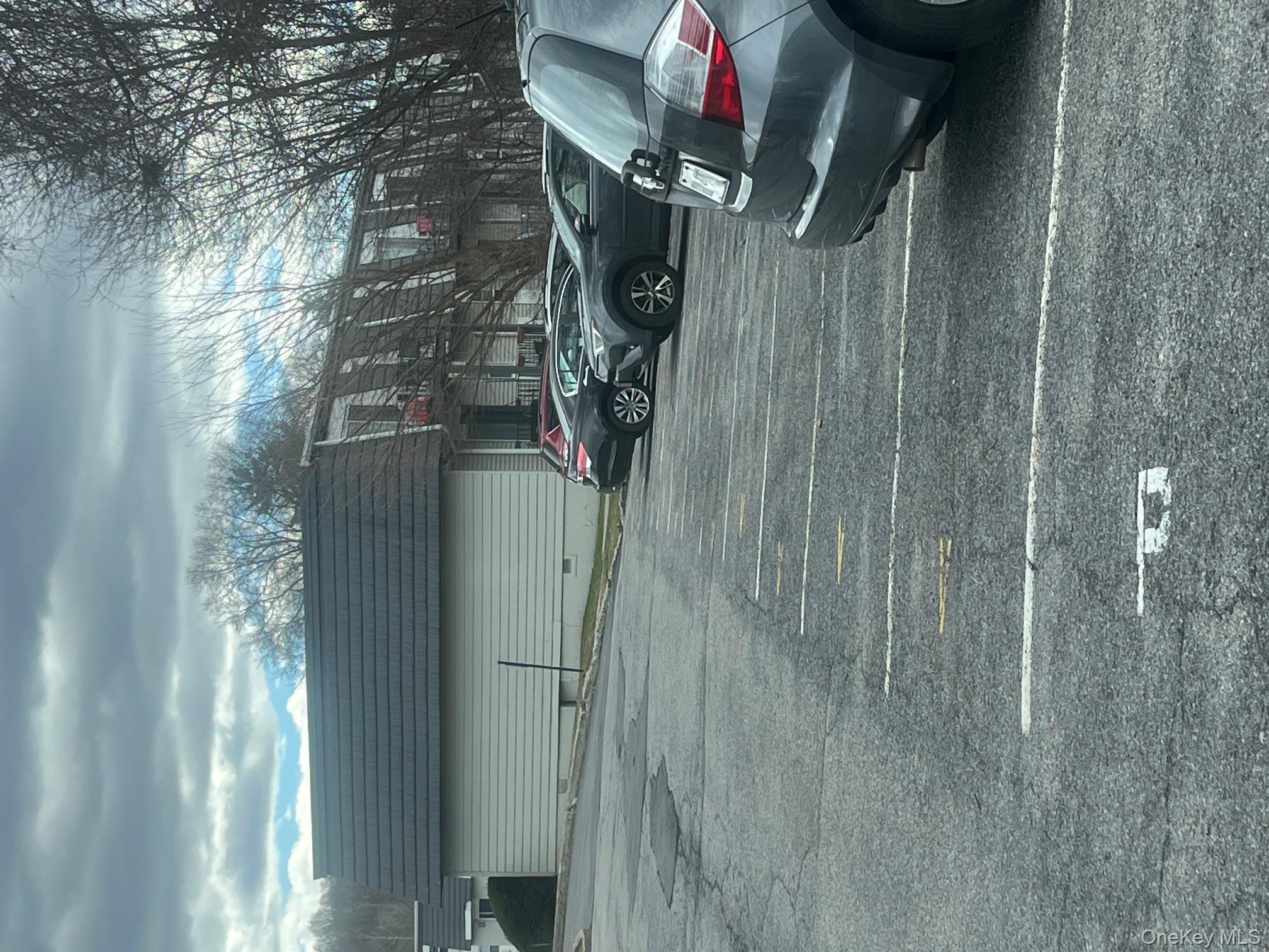 9 White Gate Road, Unit J Wappingers Falls, NY 12590 - Photo 16 of 17 Distance is one parking lot away to to laundry room bldg