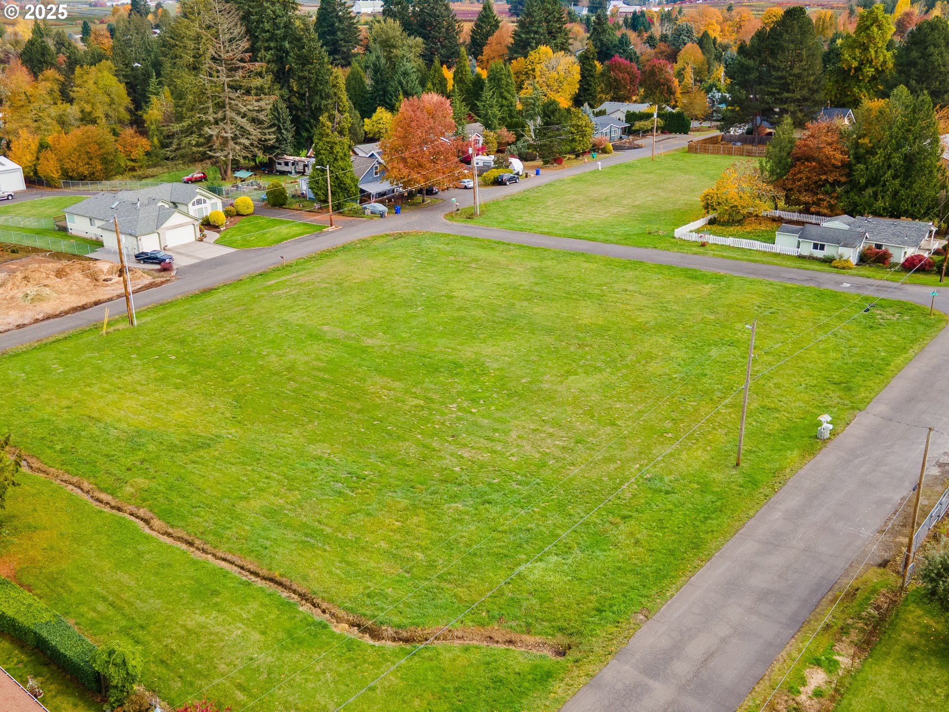 0 Southeast Mally Road Gresham, OR 97080 - Photo 16 of 16 a view of a lake with a table and chairs