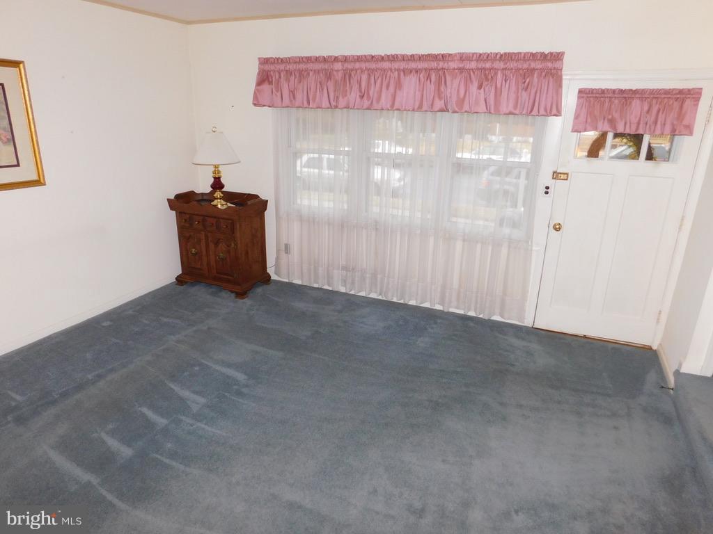 1759 Melbourne Road Baltimore, MD 21222 - Photo 3 of 30 a view of a room with wooden floor and cabinet