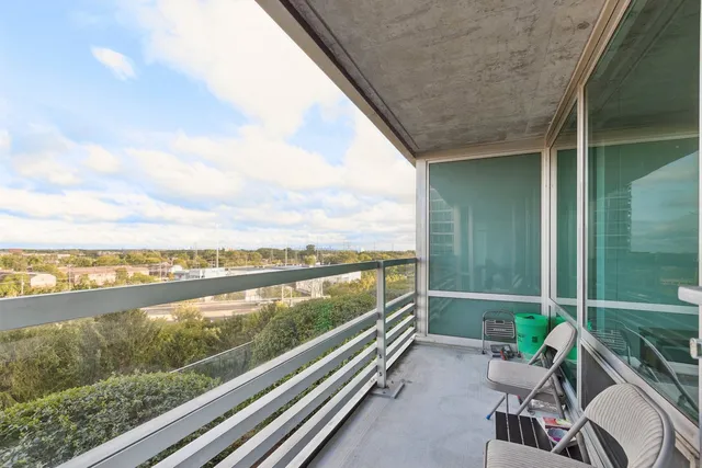 a view of a balcony with an ocean view