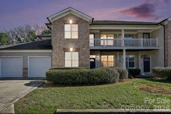 a front view of a house having yard