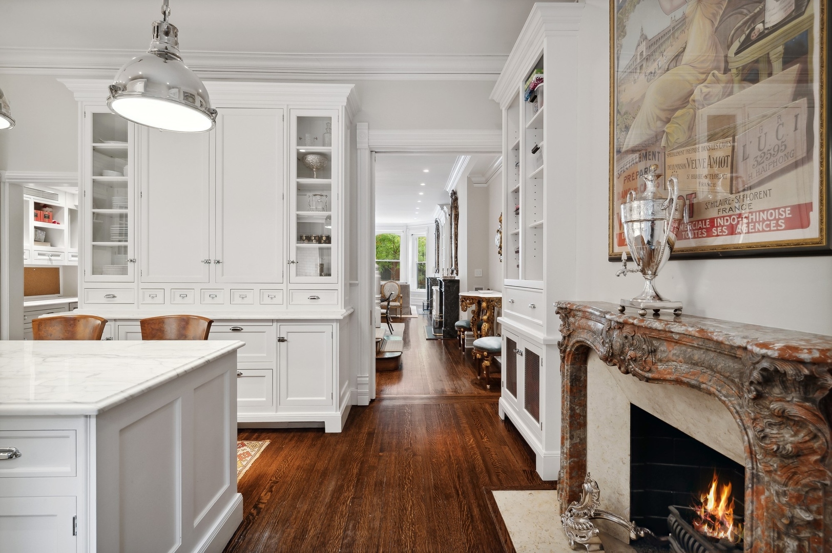 39 East Elm Street Chicago, IL 60611 - Photo 15 of 49 a kitchen with a stove a sink and a refrigerator