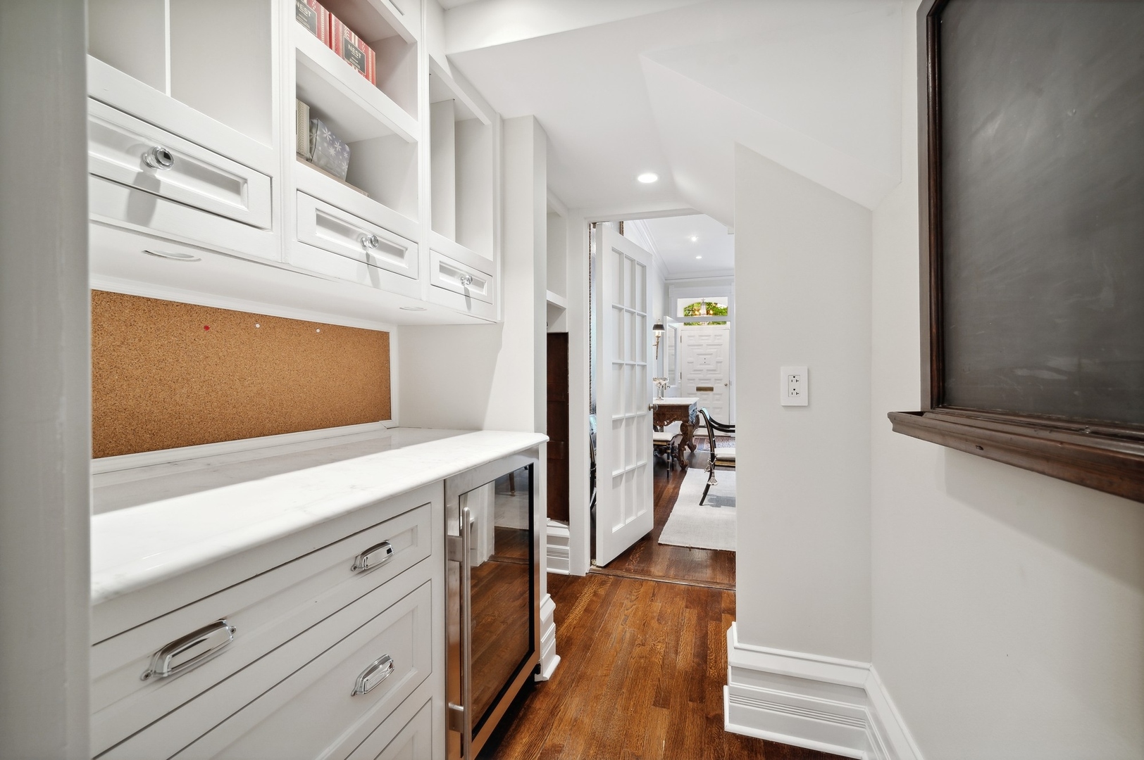 39 East Elm Street Chicago, IL 60611 - Photo 19 of 49 a view of hallway with wooden floor