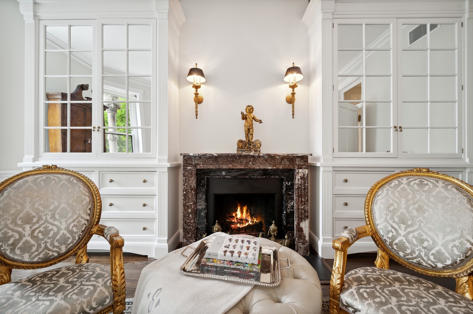 39 East Elm Street Chicago, IL 60611 - Photo 25 of 49 a living room with furniture a fireplace and decor