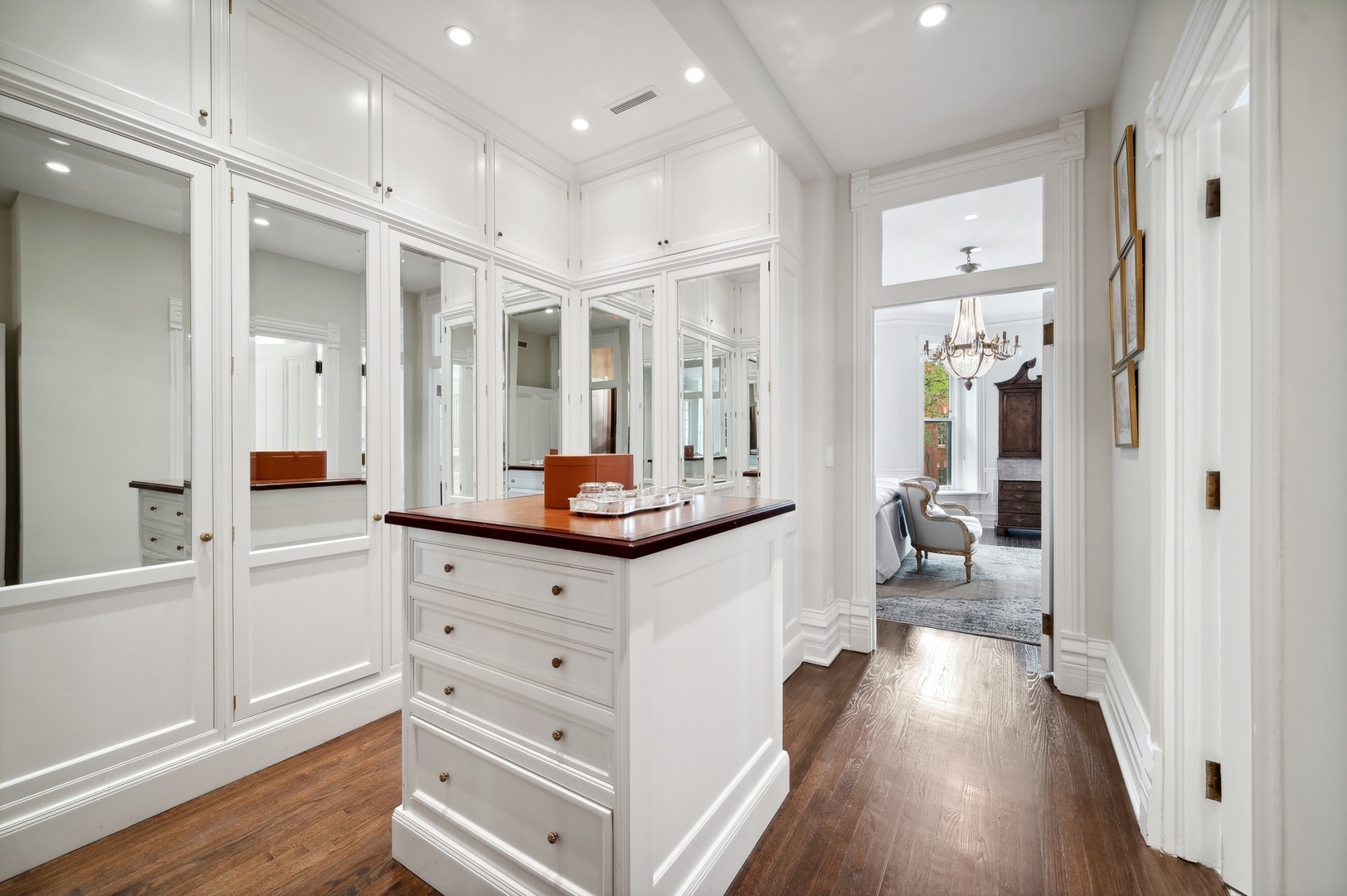 39 East Elm Street Chicago, IL 60611 - Photo 27 of 49 a bathroom with a sink a mirror and a shower