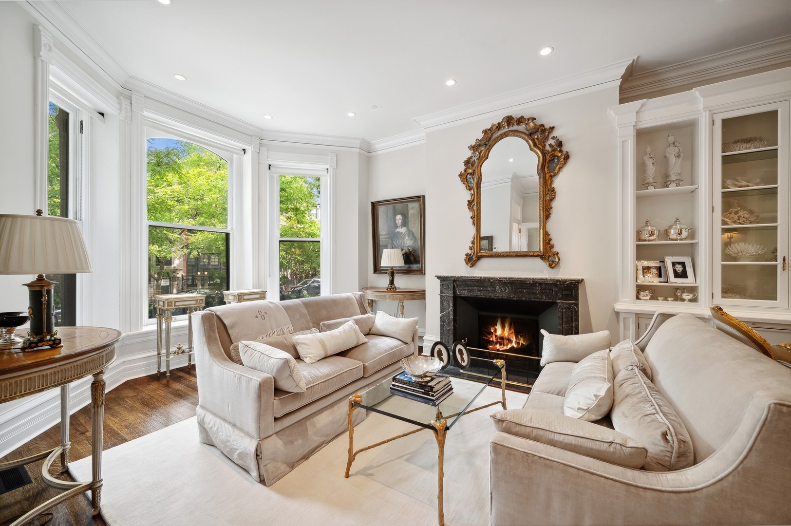 39 East Elm Street Chicago, IL 60611 - Photo 4 of 49 a living room with furniture and a fireplace