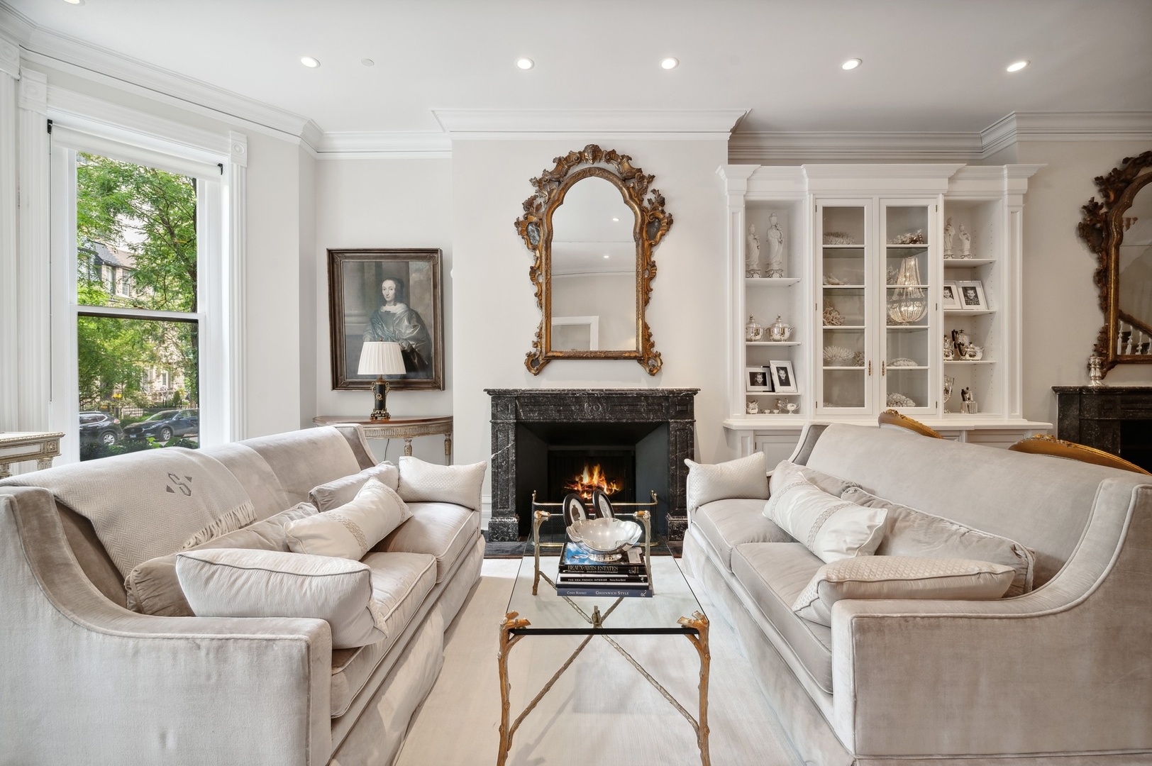 39 East Elm Street Chicago, IL 60611 - Photo 5 of 49 a living room with furniture and a fireplace