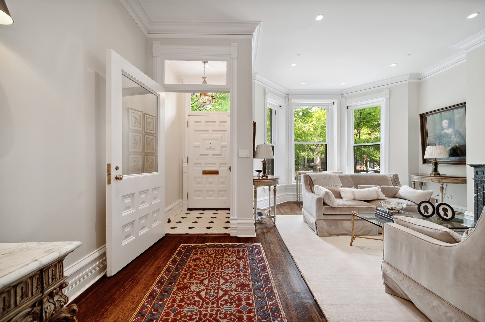 39 East Elm Street Chicago, IL 60611 - Photo 6 of 49 a living room with furniture and a rug