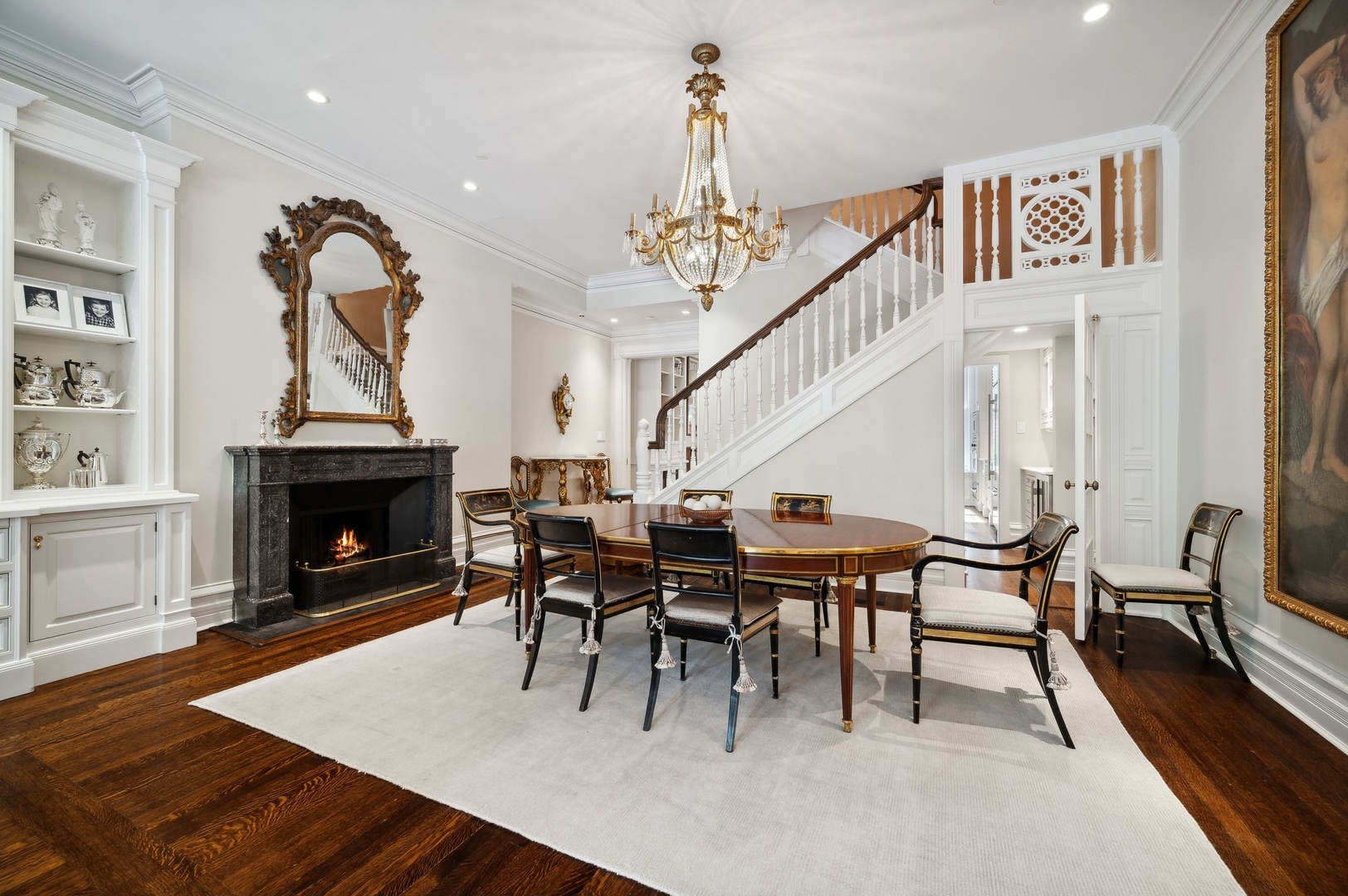 39 East Elm Street Chicago, IL 60611 - Photo 8 of 49 a view of a dining room with furniture and wooden floor