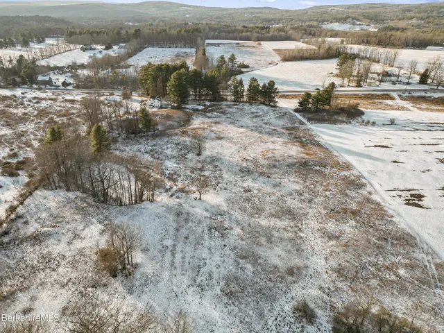 a view of a yard with a snow