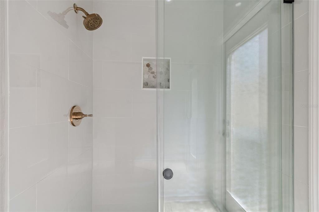 2300 Hannah Way South Dunedin, FL 34698 - Photo 19 of 49 a bathroom with a shower