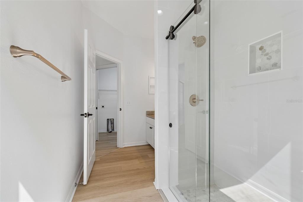 2300 Hannah Way South Dunedin, FL 34698 - Photo 20 of 49 a view of a bathroom from a hallway