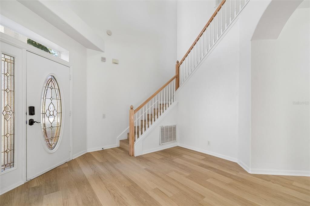 2300 Hannah Way South Dunedin, FL 34698 - Photo 21 of 49 a view of entryway with wooden floor