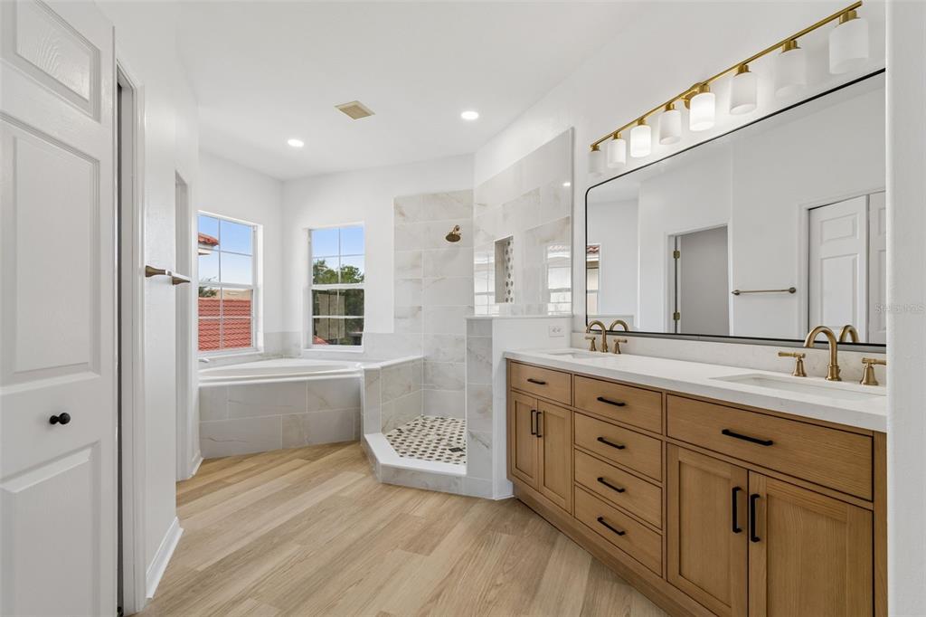 2300 Hannah Way South Dunedin, FL 34698 - Photo 26 of 49 a bathroom with a granite countertop sink mirror and double
