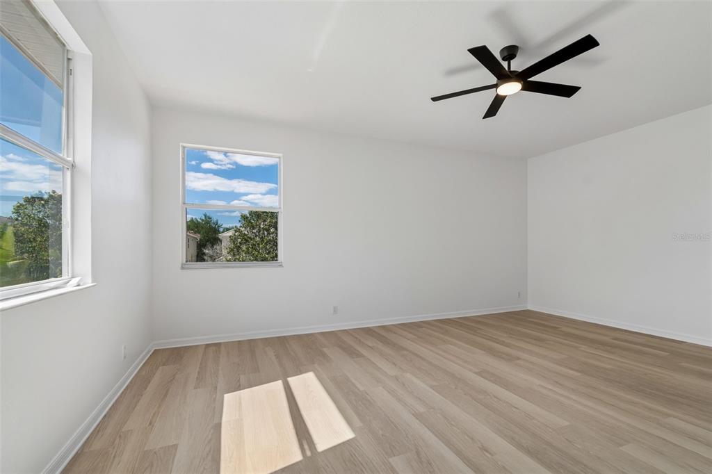 2300 Hannah Way South Dunedin, FL 34698 - Photo 37 of 49 wooden floor in an empty room with a window