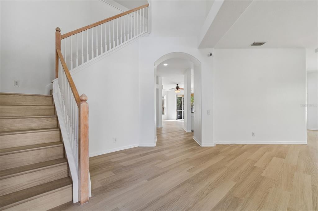2300 Hannah Way South Dunedin, FL 34698 - Photo 4 of 49 a view of entryway with wooden floor