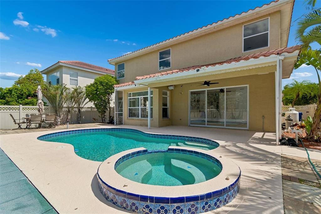 2300 Hannah Way South Dunedin, FL 34698 - Photo 45 of 49 a view of a house with swimming pool and porch