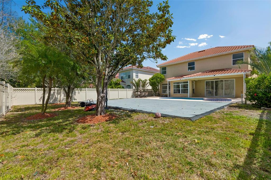 2300 Hannah Way South Dunedin, FL 34698 - Photo 48 of 49 a view of a house with a yard