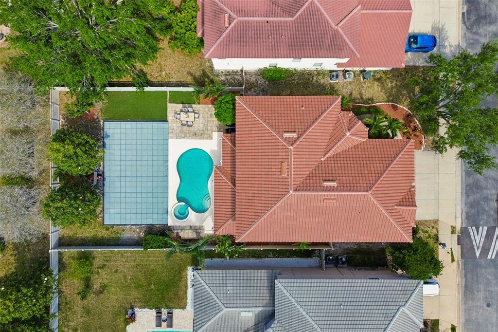 2300 Hannah Way South Dunedin, FL 34698 - Photo 49 of 49 an aerial view of a house with a garden and swimming pool